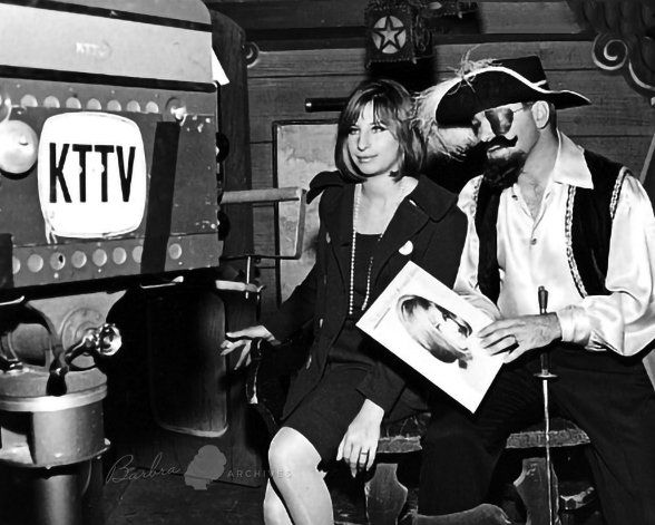 Wider cropped photo of Streisand and Lamond.