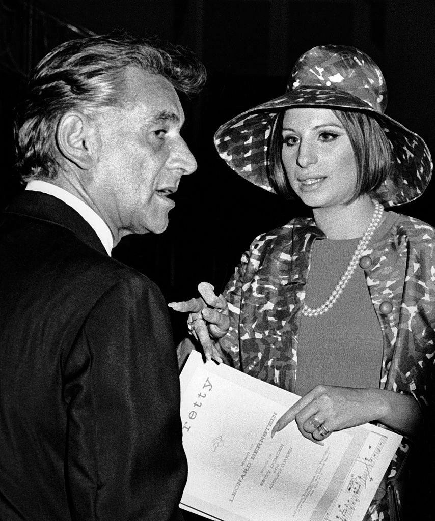 Leonard Bernstein and Barbra Streisand, holding the sheet music to  