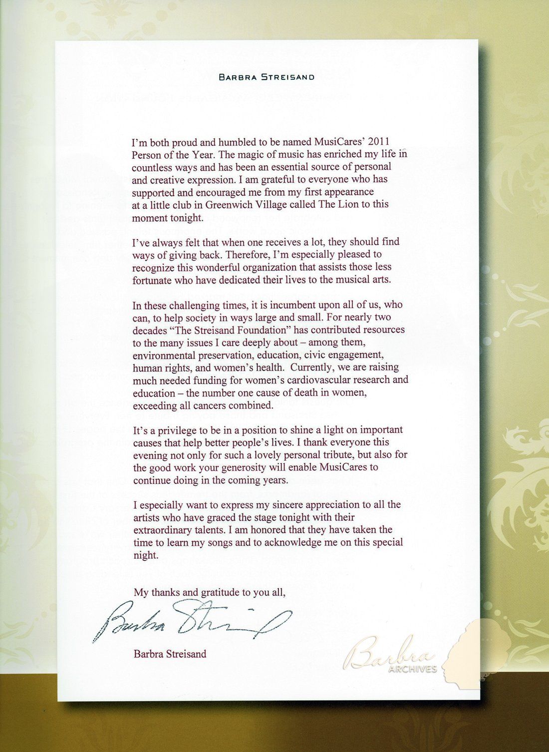 A page from the MusiCares concert program with Streisand's note. A page from the MusiCares concert program with Streisand's note.