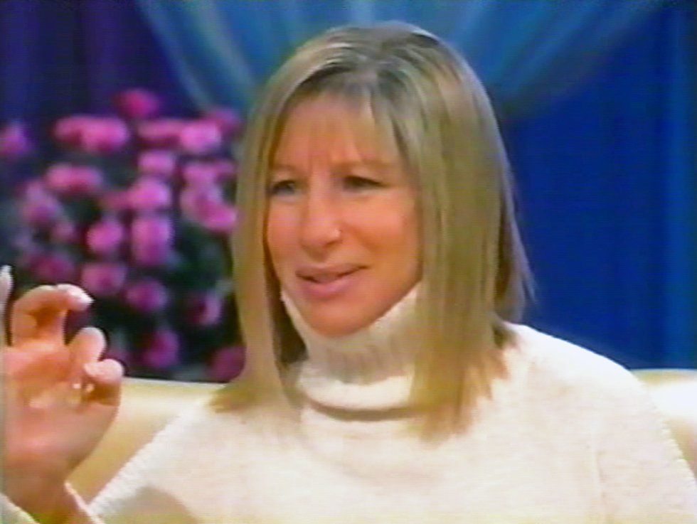 Streisand in white turtleneck sweater on Oprah.