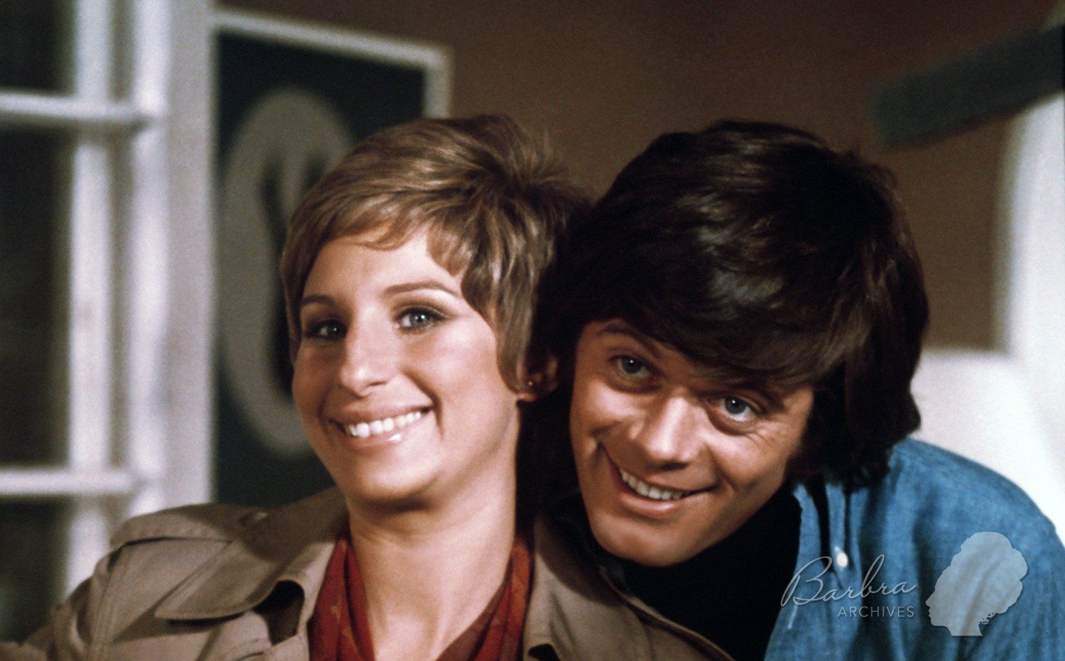 Streisand and Sarrazin share a laugh on the set of the movie. Streisand and Sarrazin share a laugh on the set of the movie.