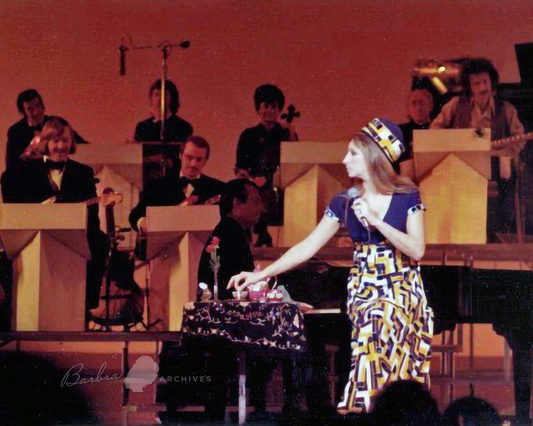 Streisand puts out her “cigarette” on stage at the Riviera.