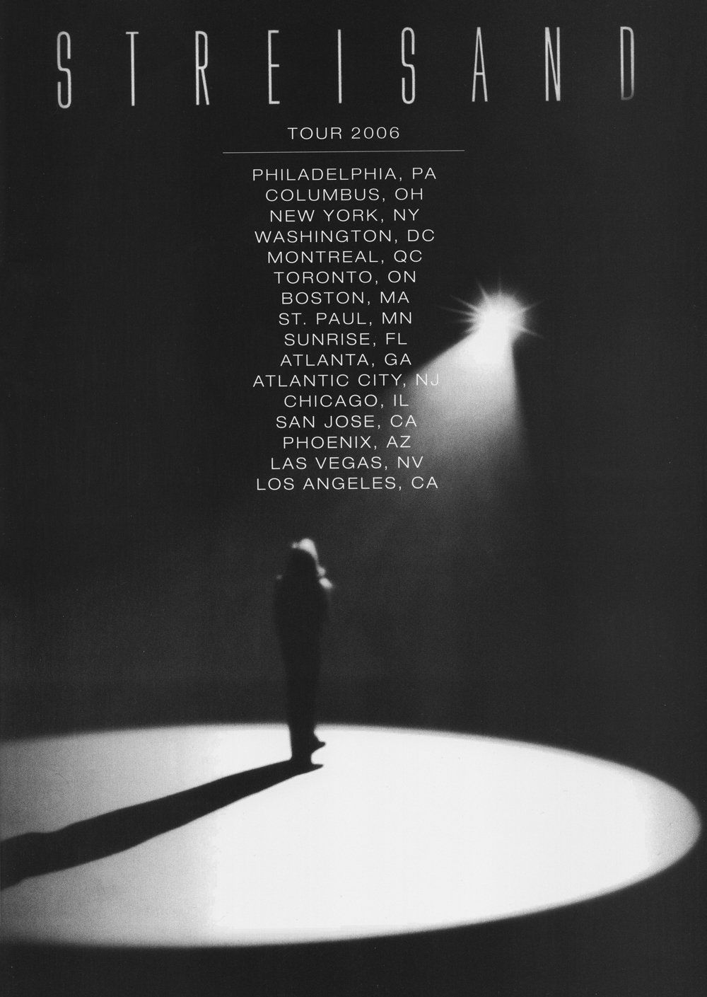 2006 Tour Art featuring Streisand standing in a spotlight