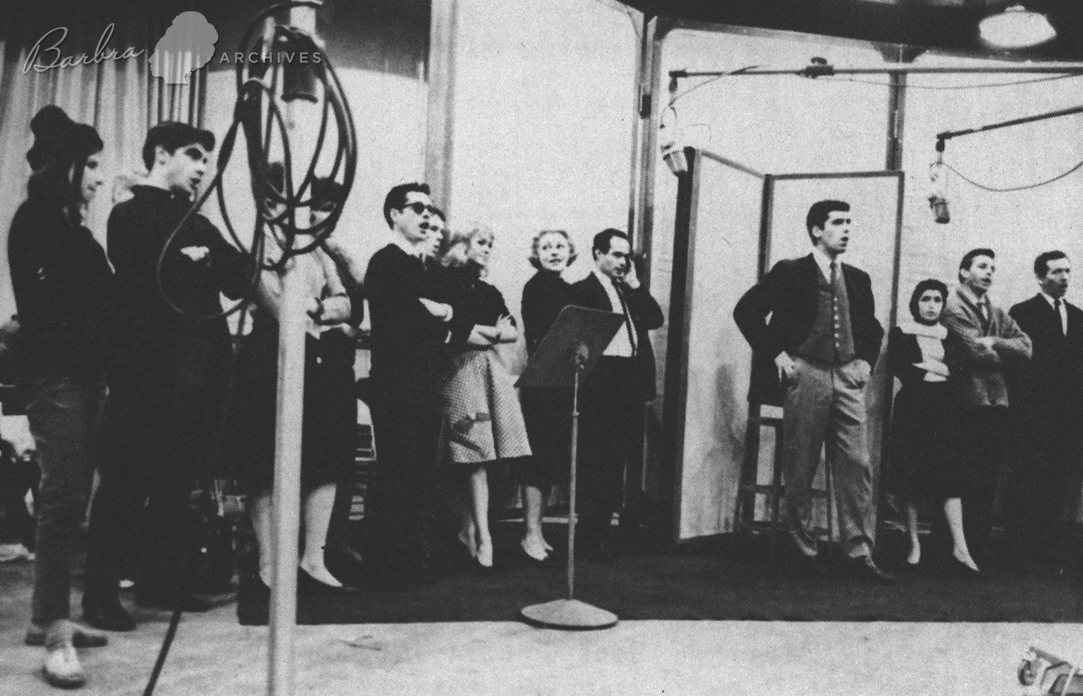 The entire cast gathered in the recording studio.