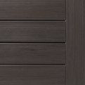 Close-up of dark brown wooden paneling with horizontal grooves and a narrow vertical strip on the right
