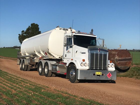 Fuel-truck-waiting-in-line-for-unloading-at-a-fuel-automobile-refueling