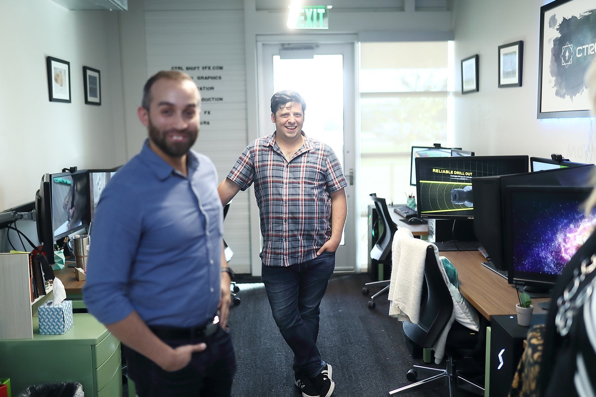 people touring the new office space