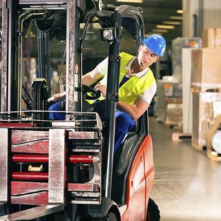 A Man Checking the Load of Forklift — Staten Island, NY — General Forklift