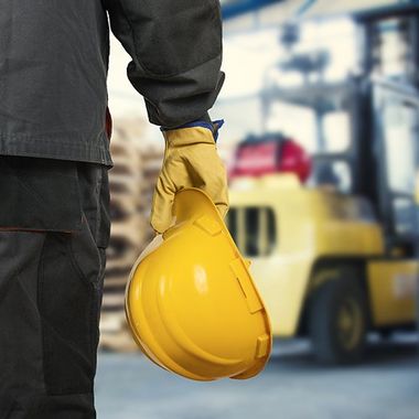Operator Holding a Yellow Helmet — Staten Island, NY — General Forklift Operator Holding a Yellow Helmet — Staten Island, NY — General Forklift