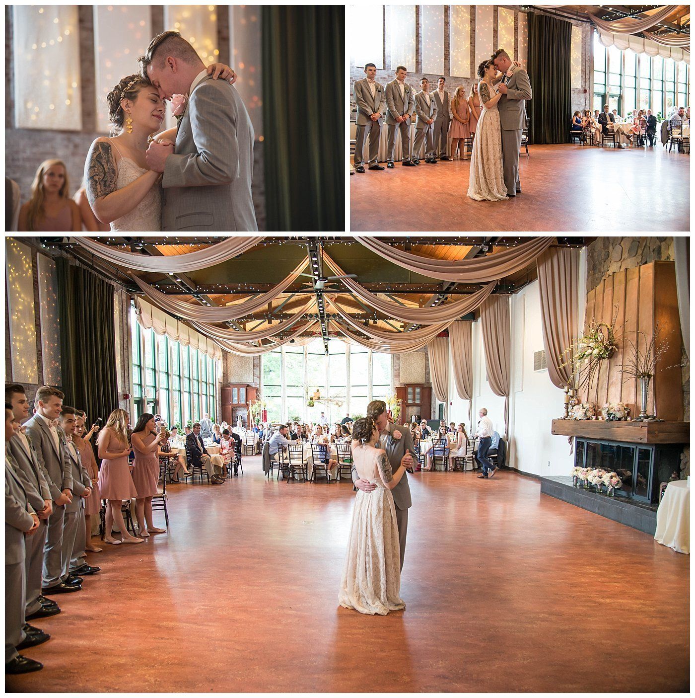 Wedding couple dancing in a decorated reception hall with guests watching