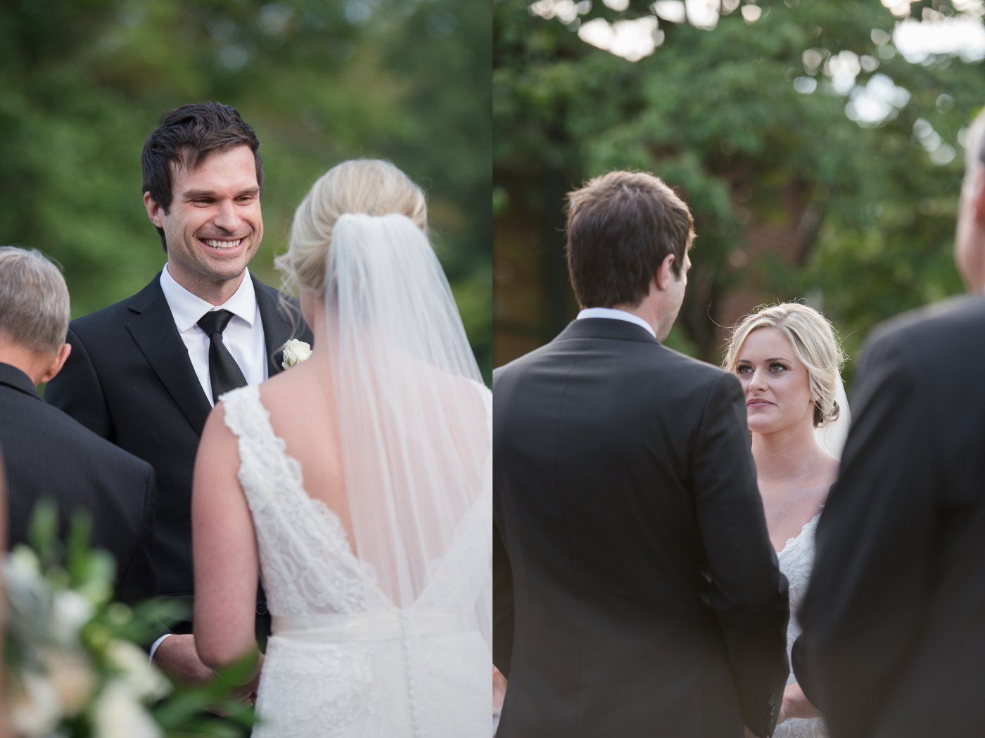Wedding guests gathered outdoors, with a bride in a white veil and guests in black suits smiling nearby