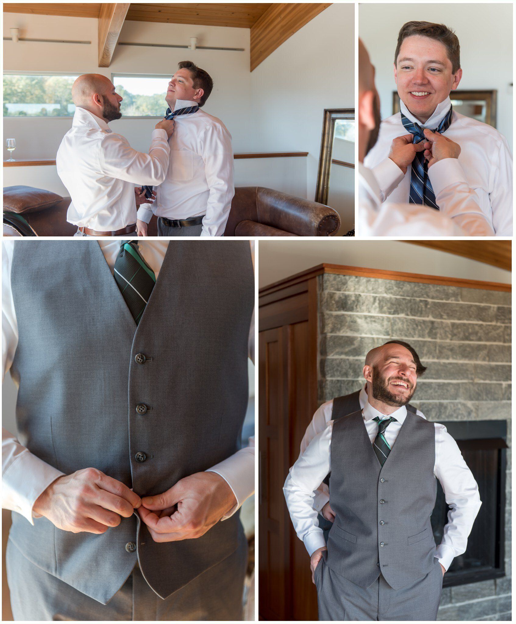 Man adjusting suit jacket and bow tie in a rustic indoor setting, smiling in a gray vest and white shirt