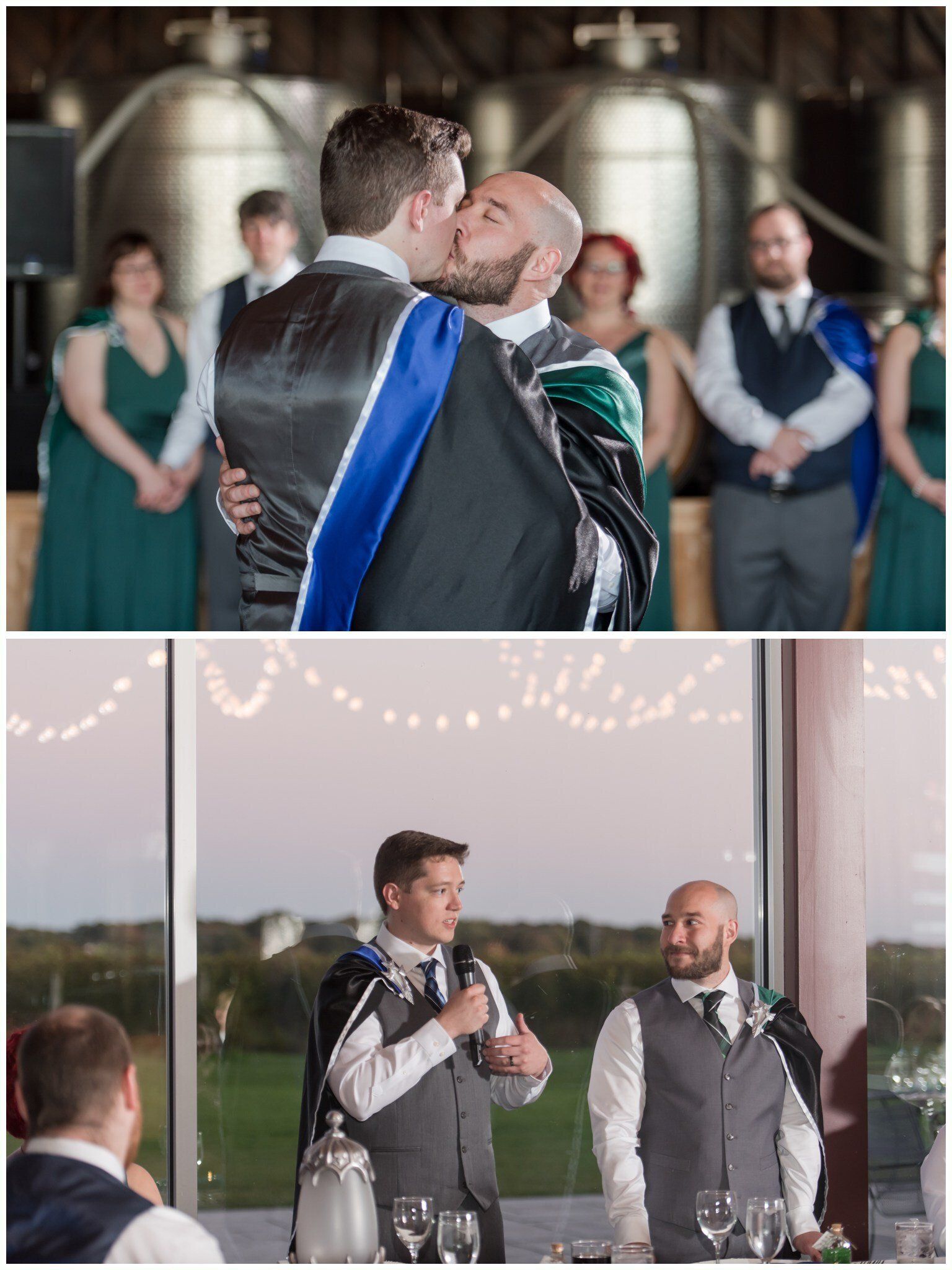 Two grooms in tuxedos share a kiss and toast at a wedding reception with string lights and guests behind them.