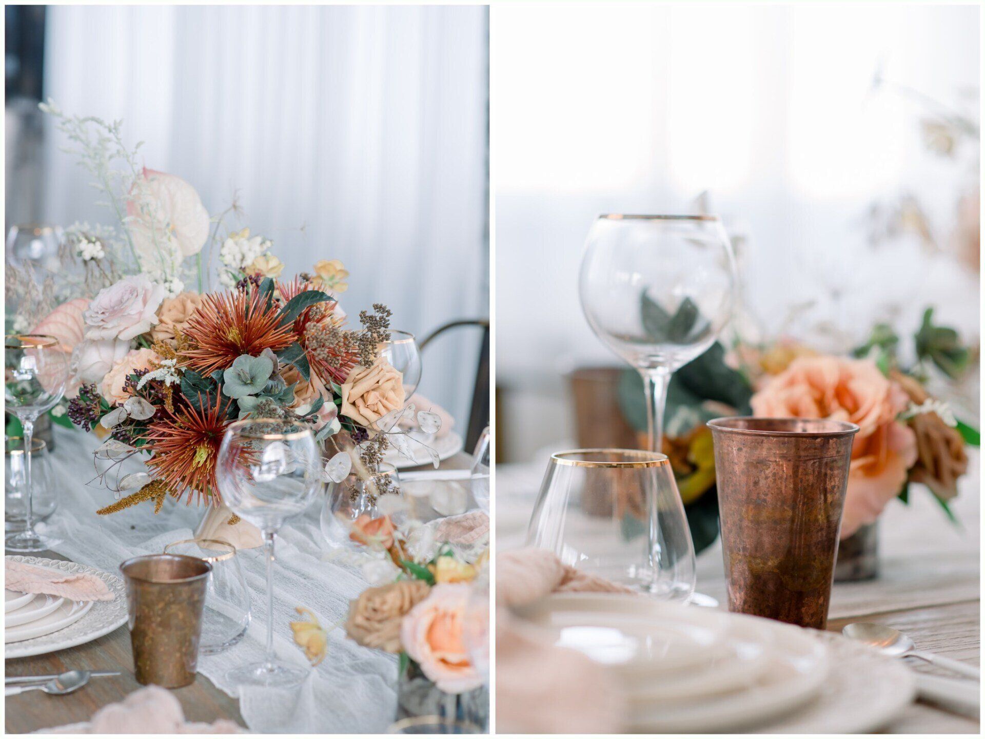 Elegant table setting with peach floral centerpiece, wine glasses, and copper candleholders