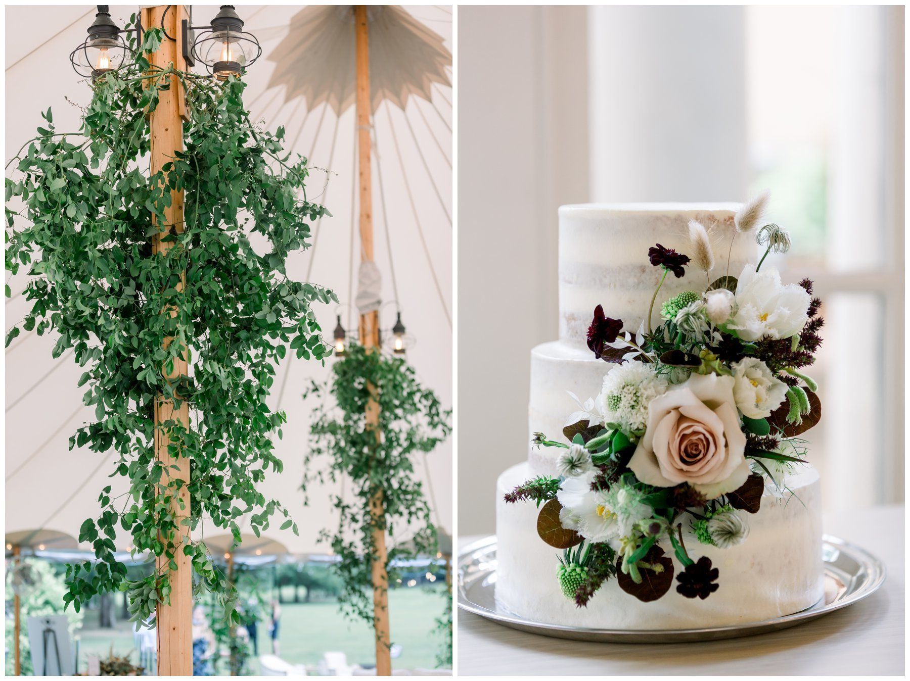 White floral wedding cake beside a hanging greenery installation in a bright event space