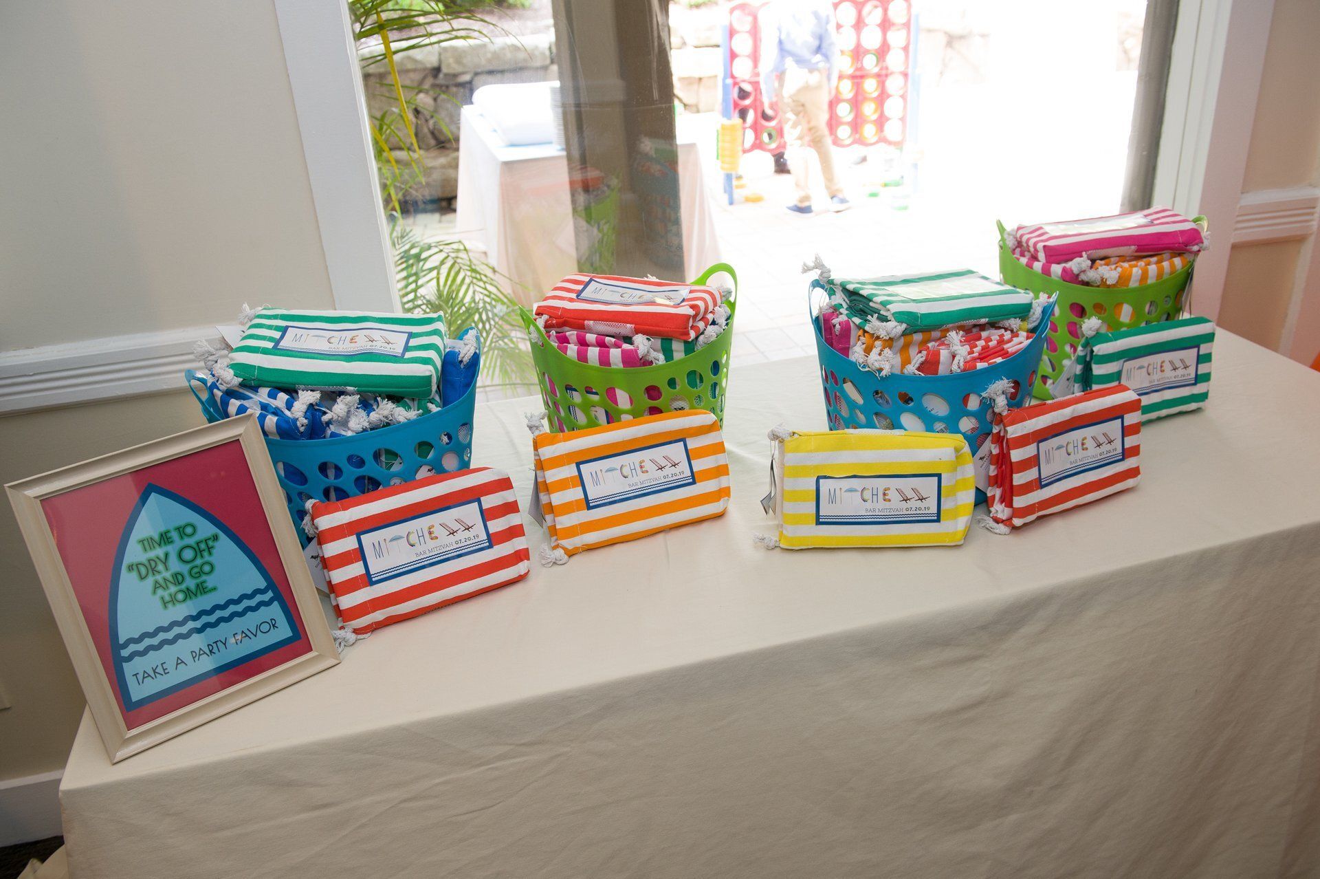 Decorated gift boxes and cards arranged on a table by a bright window