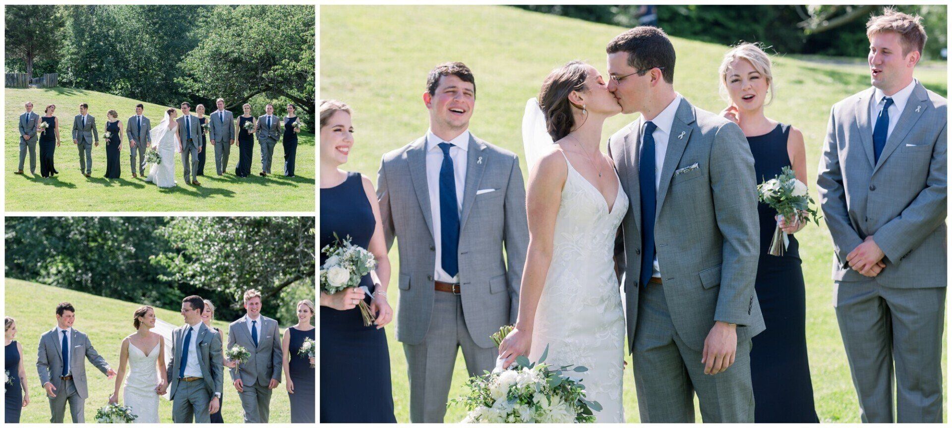 Wedding party posing outdoors on a sunny lawn, with bride and groom centered among guests in gray suits.