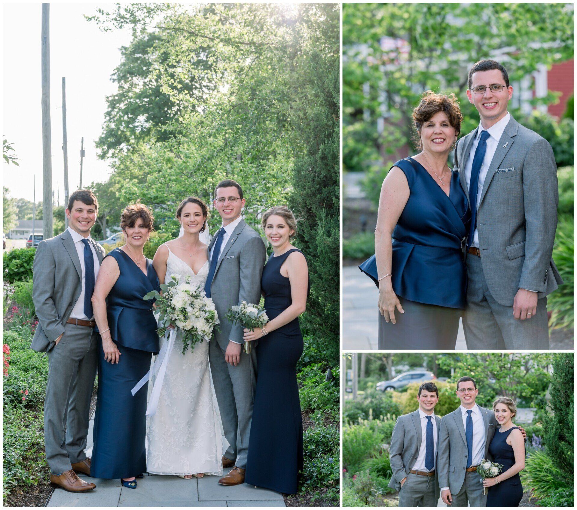 Wedding party posing outdoors, with bride in white and attendants in navy and gray suits and dresses.