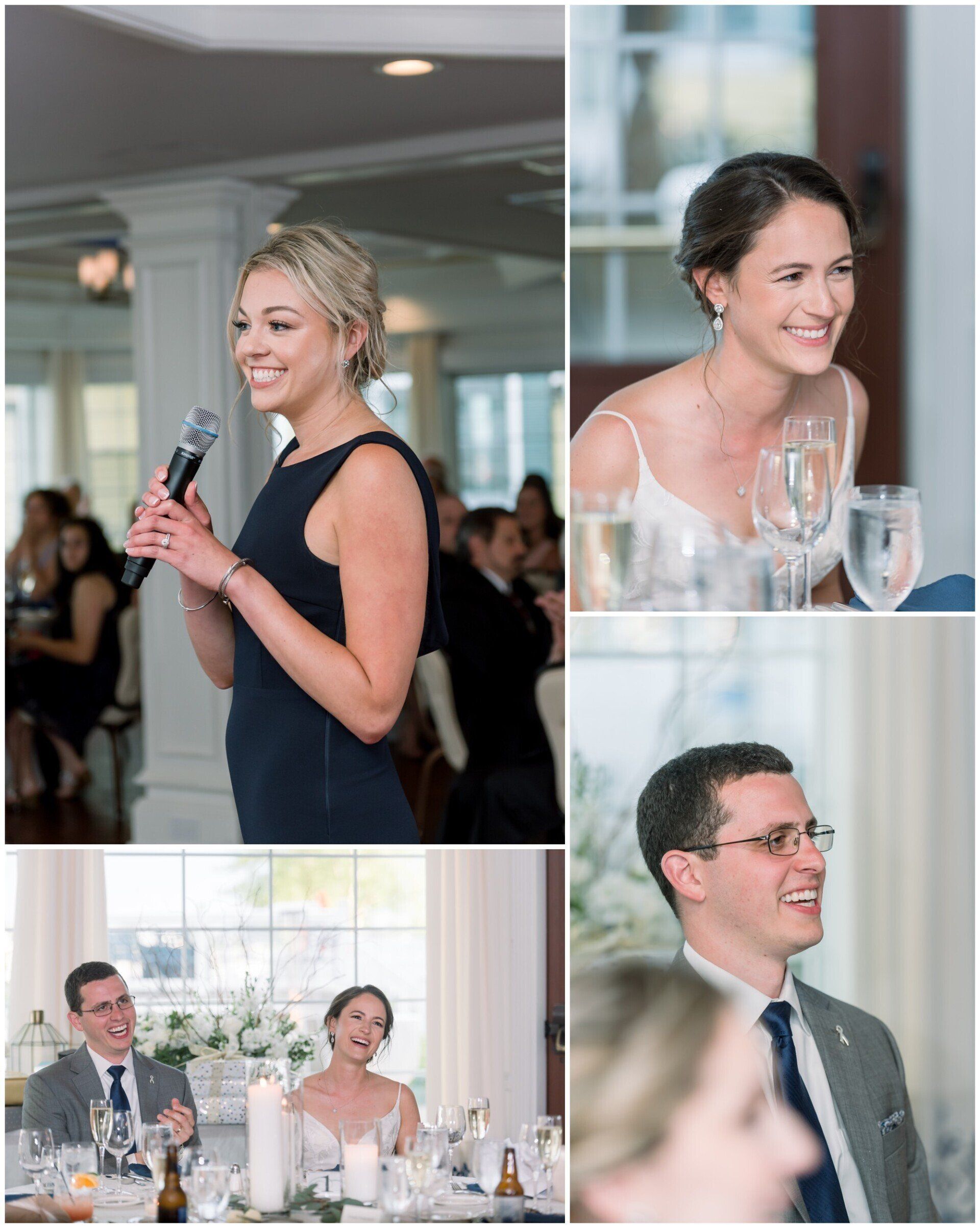 Woman speaking into a microphone at a formal event, with guests listening and smiling nearby