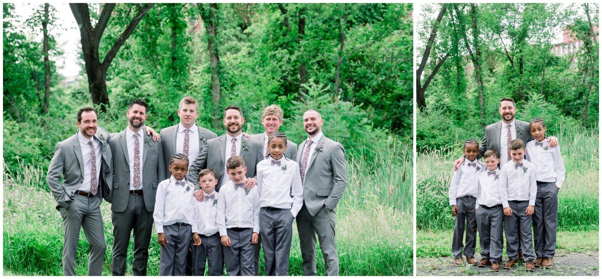 Group of adults and children posing together outdoors in front of green trees.