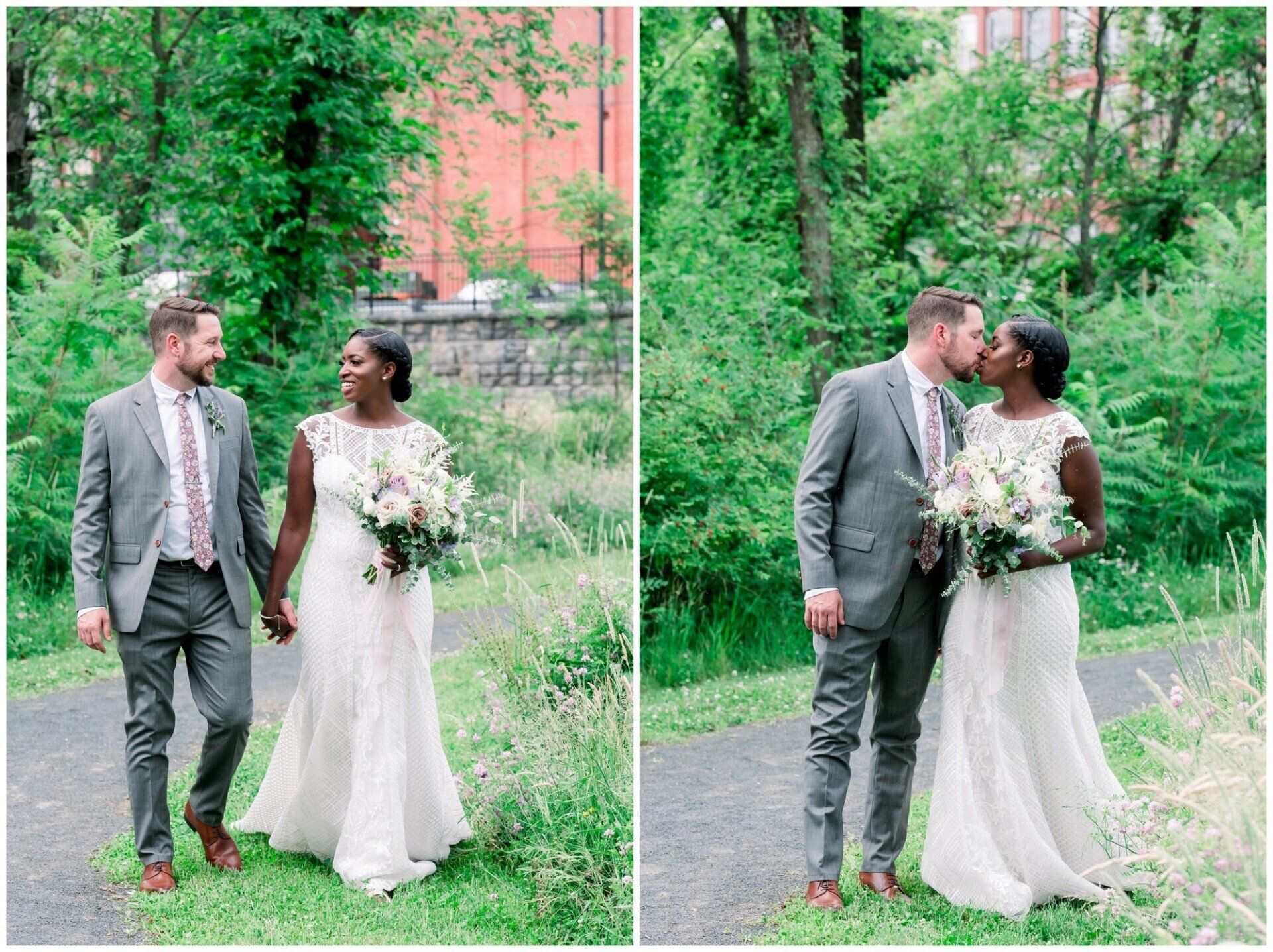 Bride and groom in a lush garden, walking and sharing a kiss, with greenery and a brick building behind them