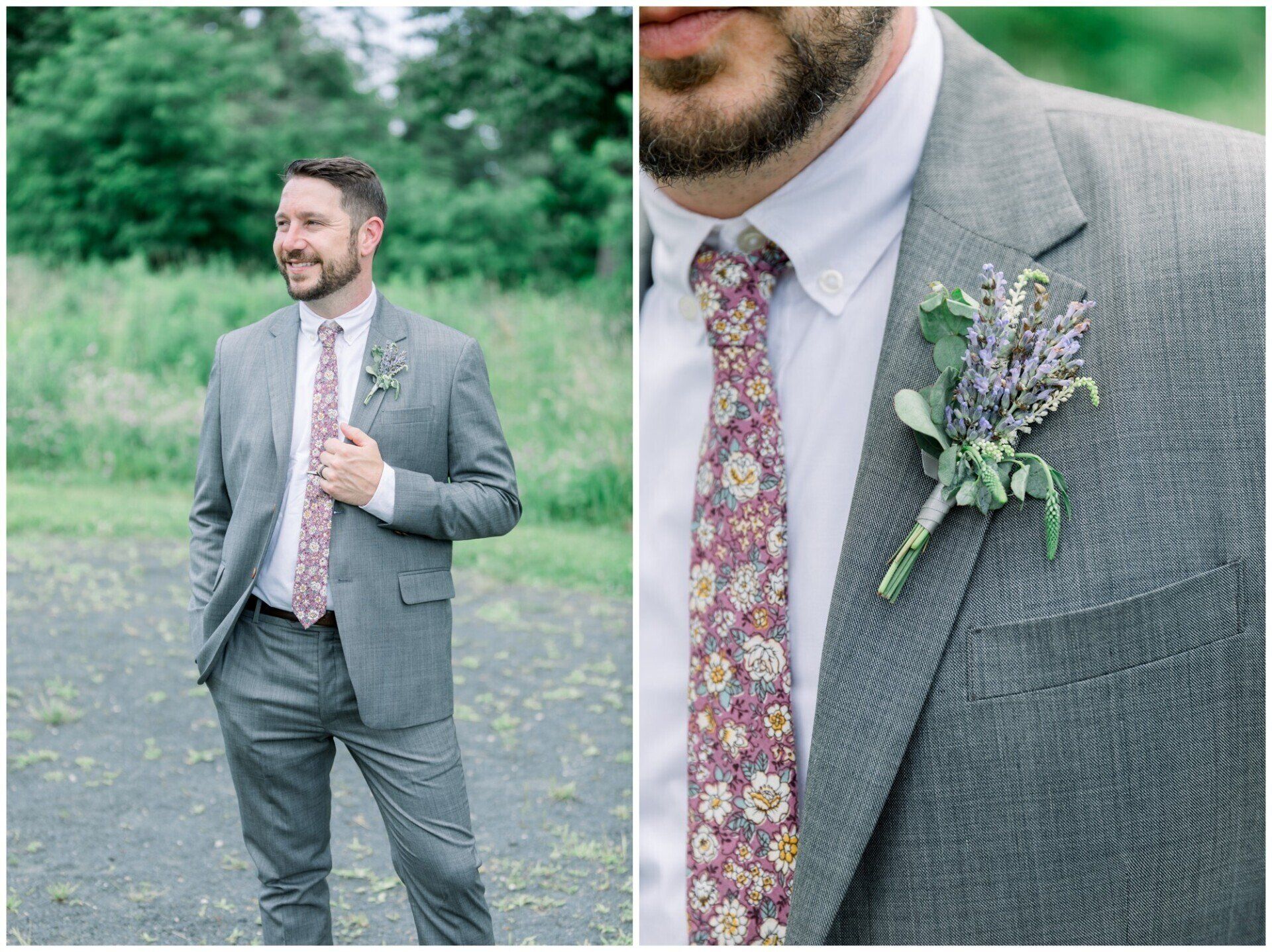 Man in gray suit with floral tie and boutonniere standing outdoors on a paved path