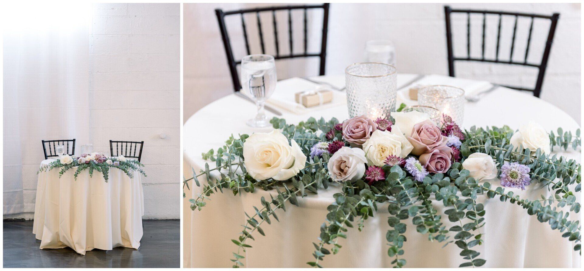 Elegant round table with cream linens and lush white, pink, and green floral centerpiece with black chairs nearby