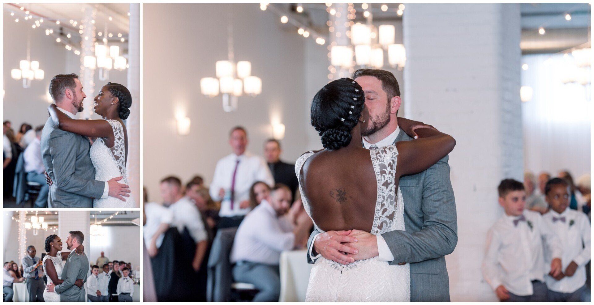 Bride and groom dance at a wedding reception with guests seated in the background