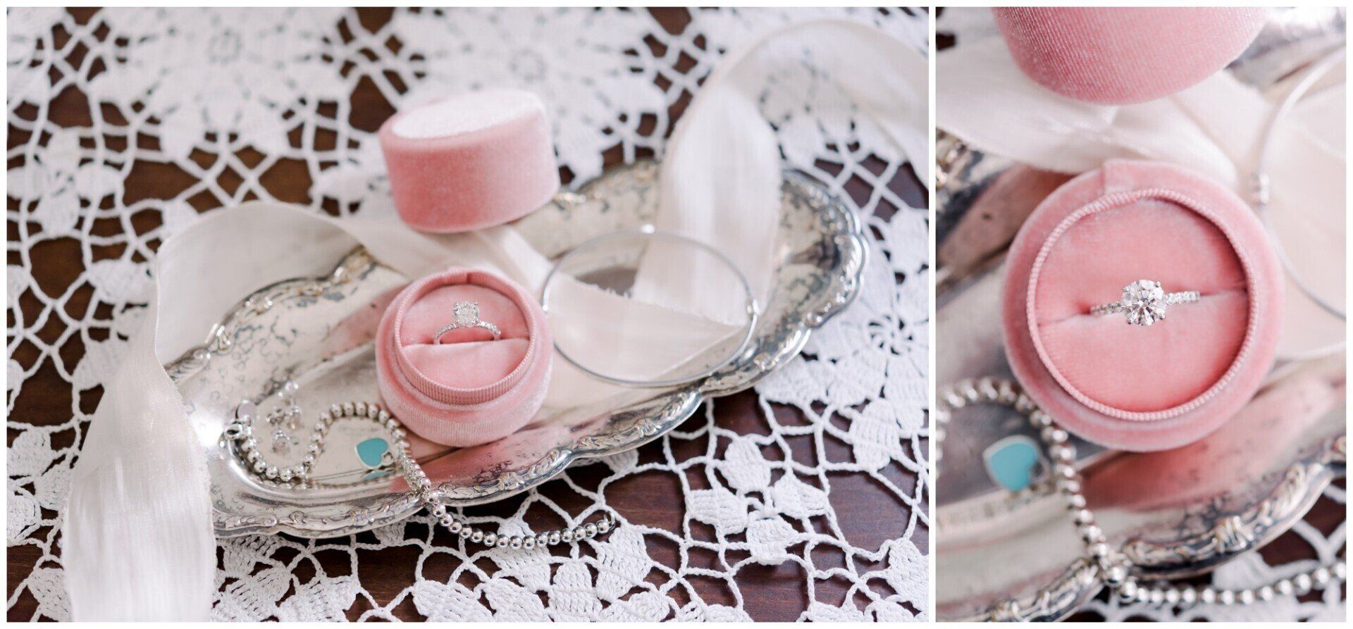 Pink perfume bottle on a lace tablecloth with a silver tray and decorative glass dish