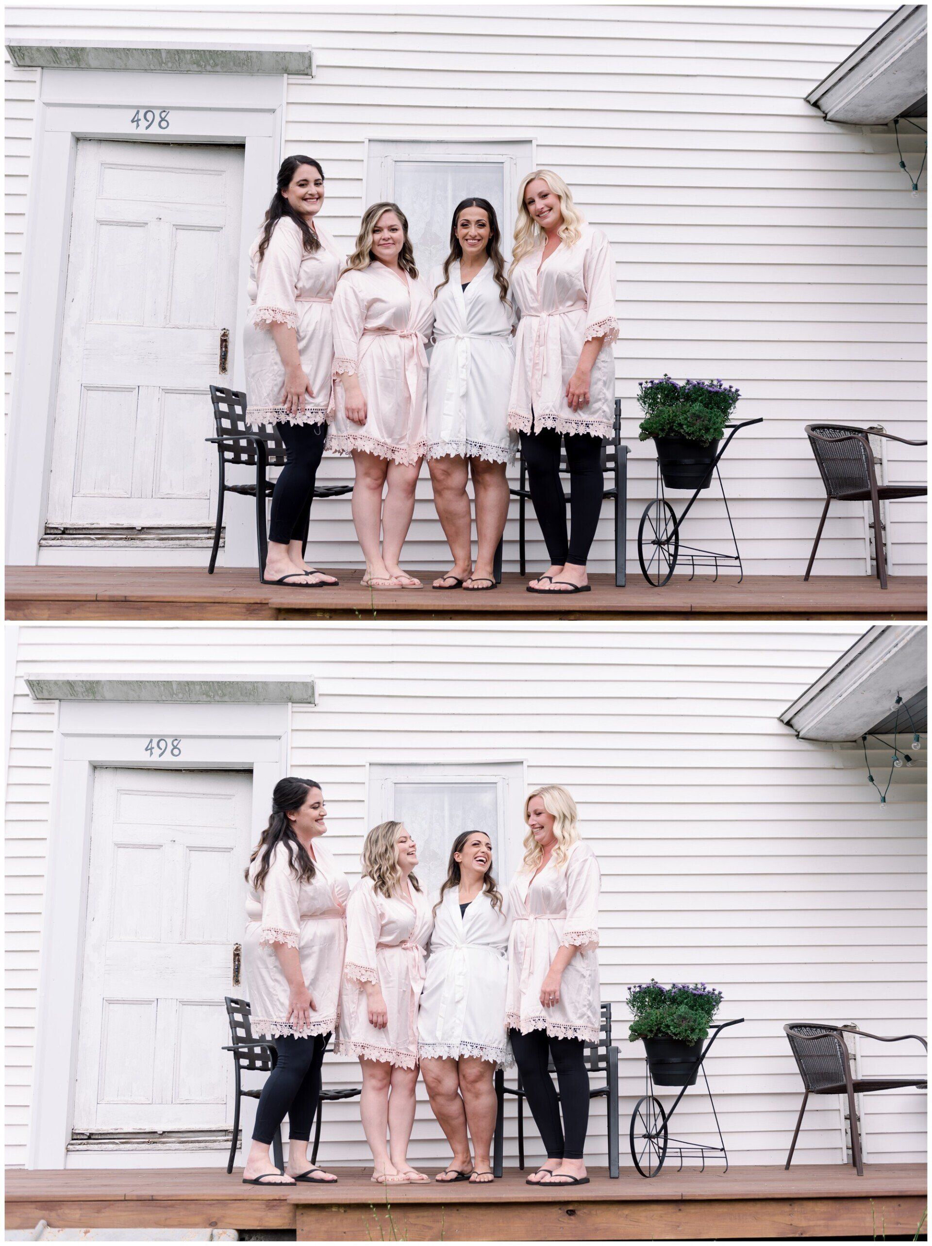 Four women in white dresses pose on a porch beside a white house and potted plant.
