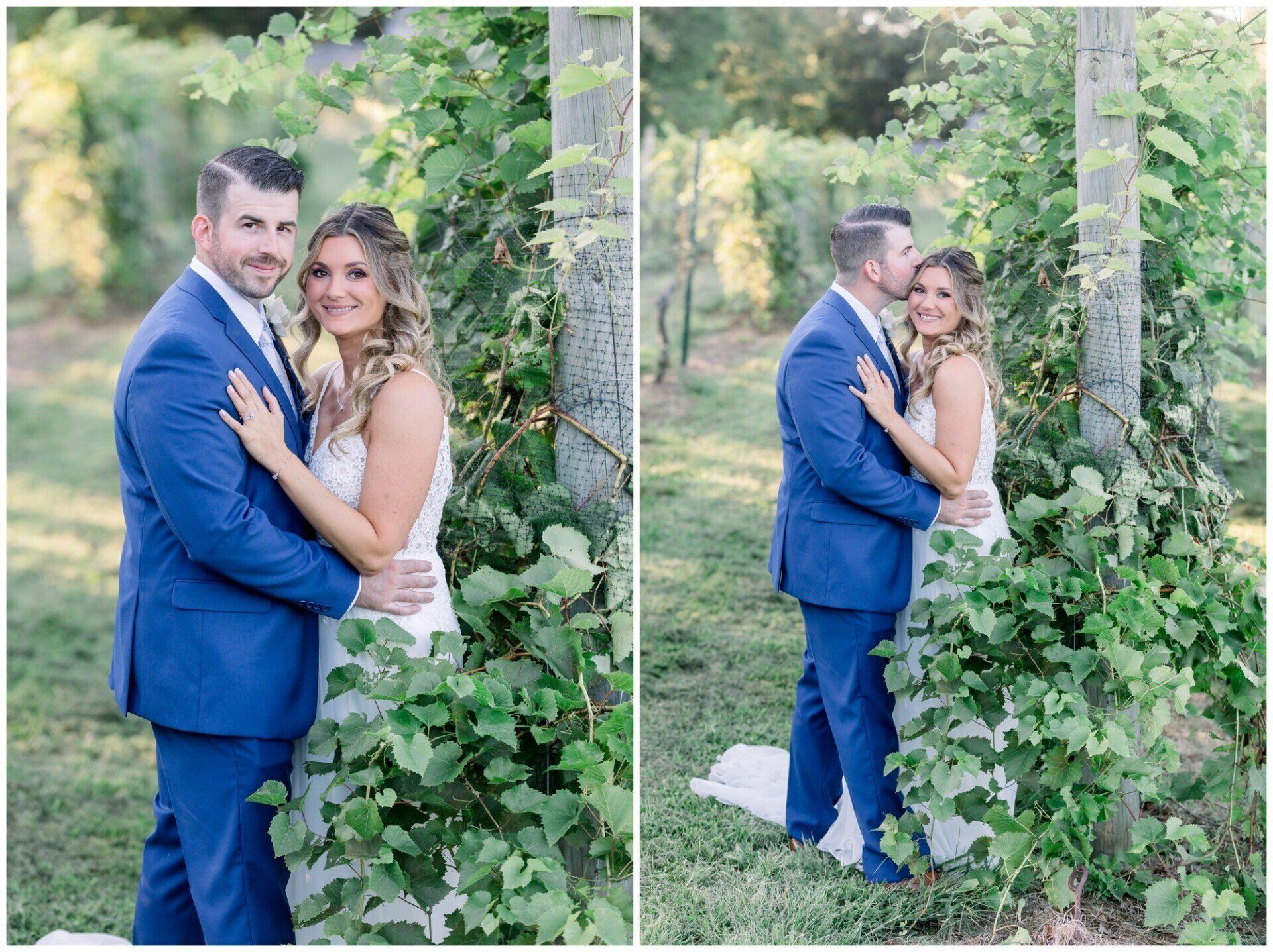 Couple in blue suit and white dress posing together amid lush greenery