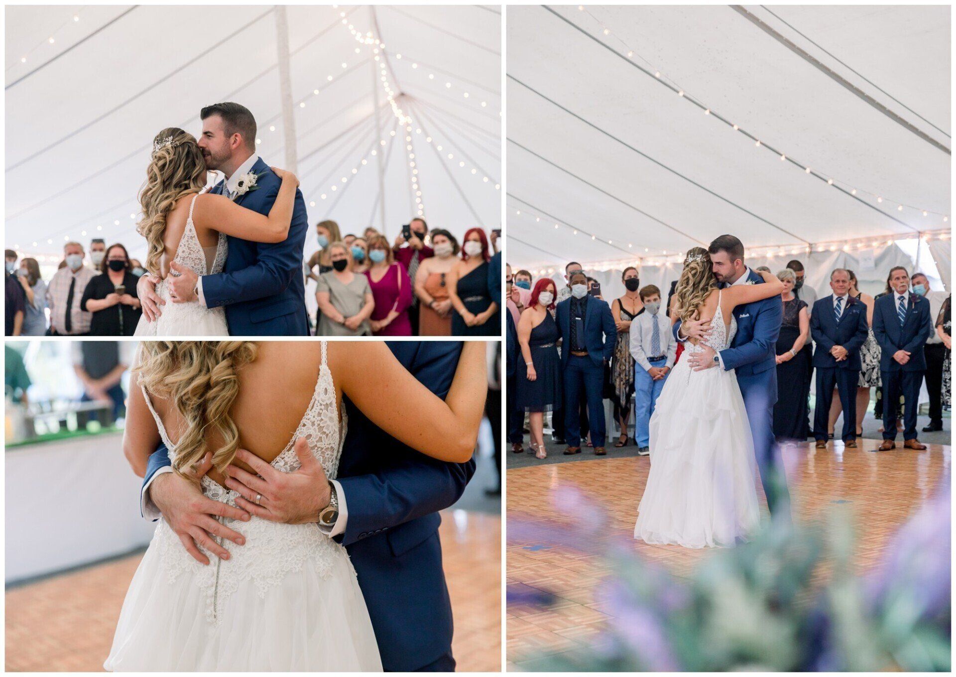 Couple slow dancing under a white tent at a wedding reception, surrounded by guests.