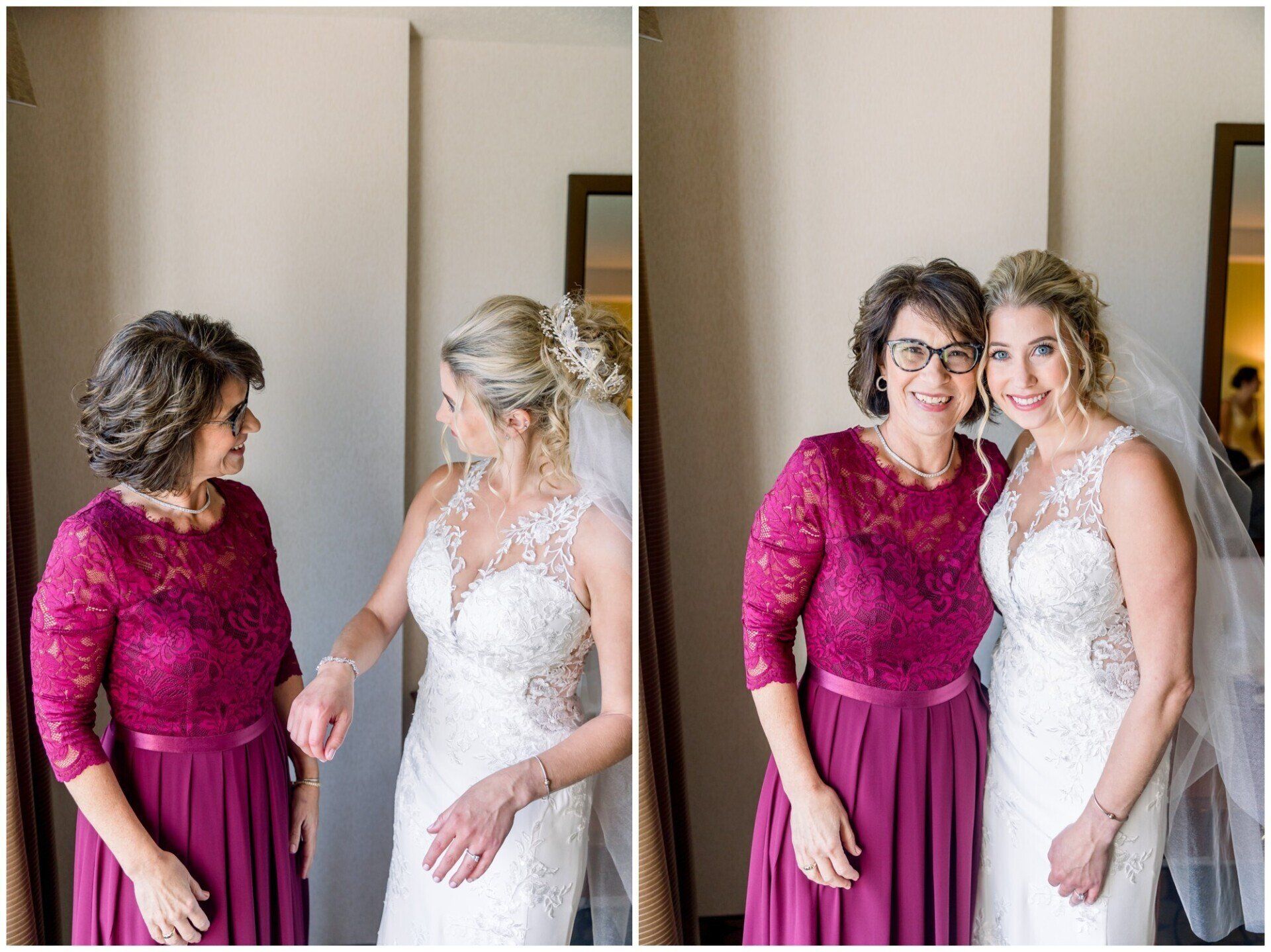 Two women pose together in a room, one in a white lace wedding dress and one in a bright pink dress.