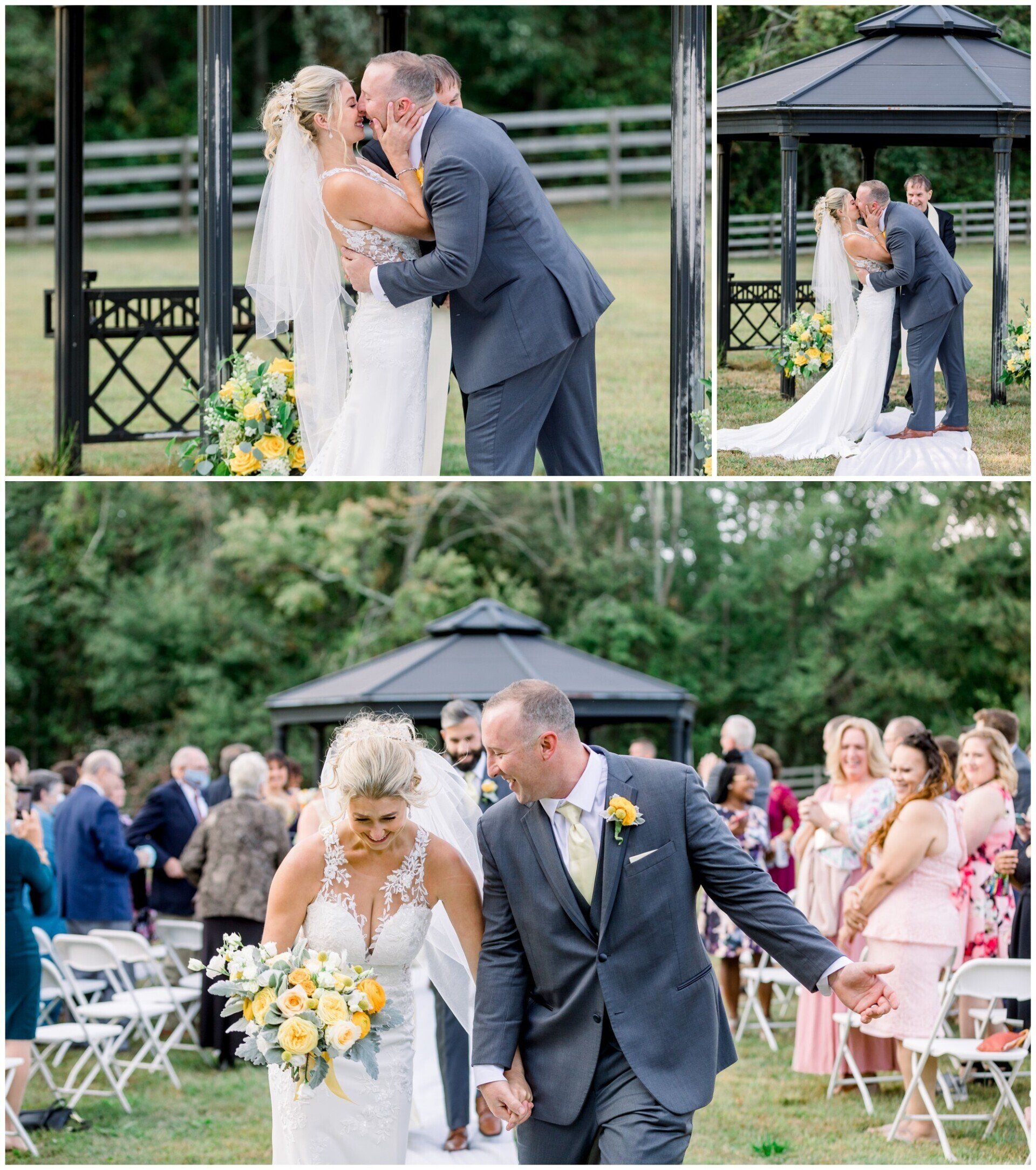 Wedding couple kissing and walking hand in hand outdoors by a gazebo, with guests seated nearby.