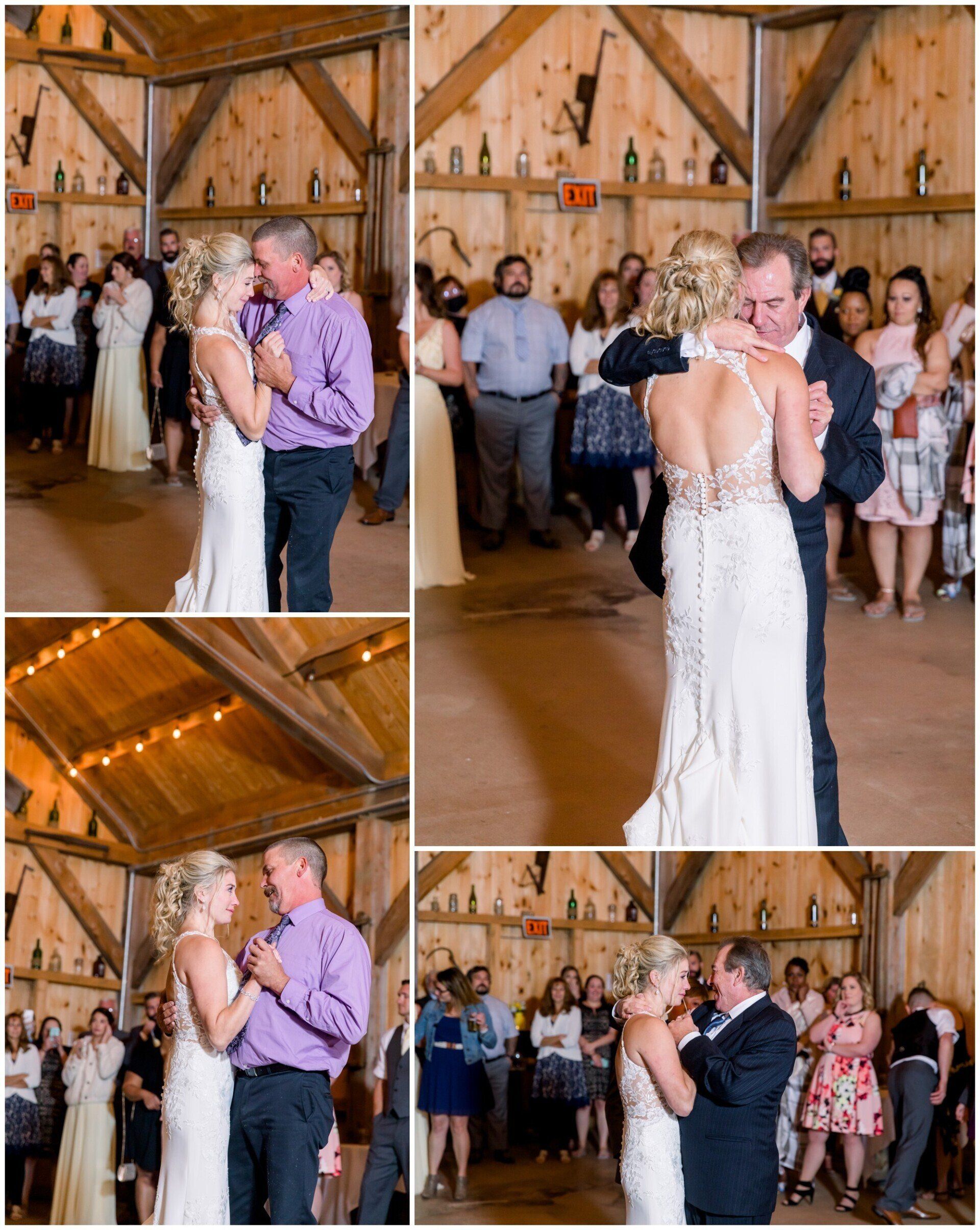 Wedding couple dancing in a rustic barn while guests watch and smile
