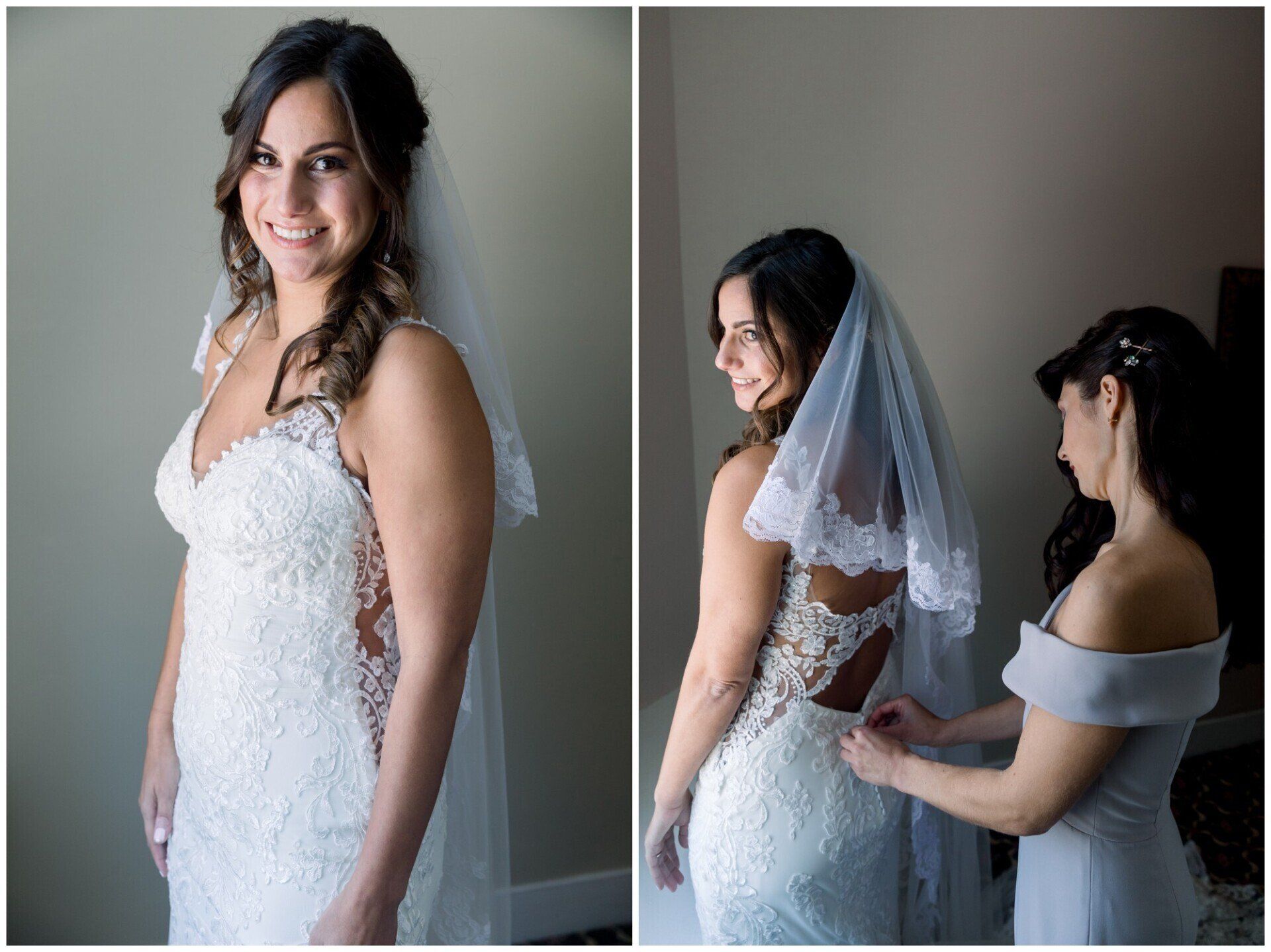 Bride in white dress smiles while two attendants adjust her veil in a softly lit room
