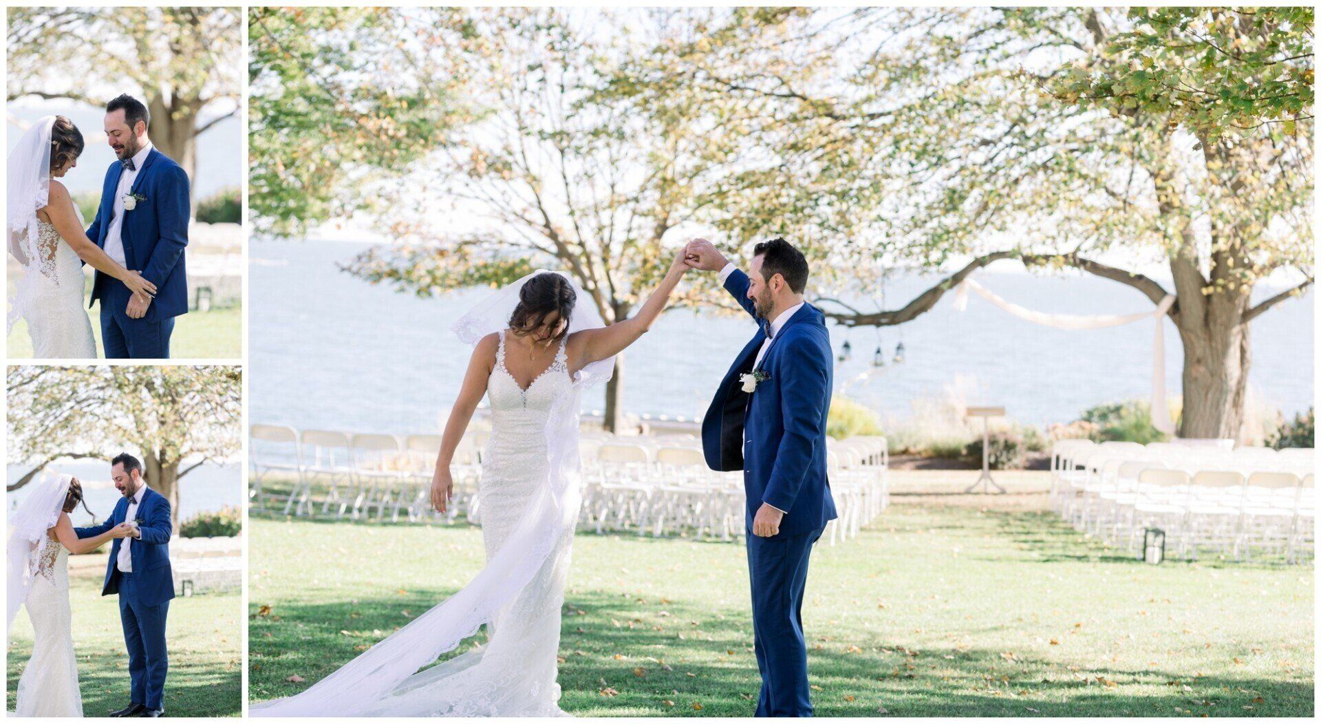 Bride and groom in wedding attire share a kiss outdoors beneath blooming trees by the water