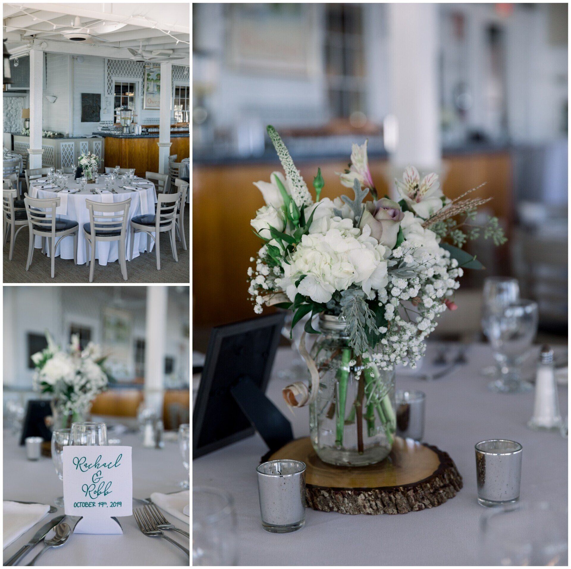 White floral table centerpiece in a bright wedding reception room, with round tables set for guests
