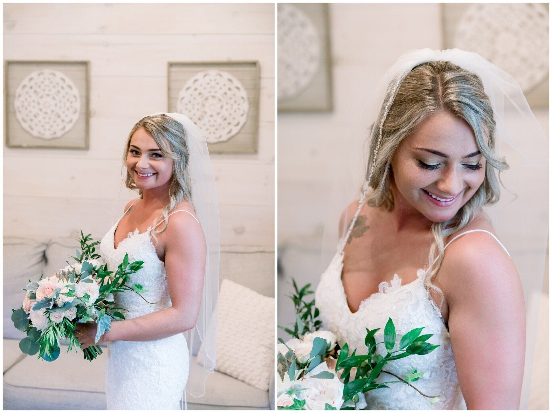 Bride in a white lace dress holding a white-and-green bouquet, smiling in a soft, bright room.