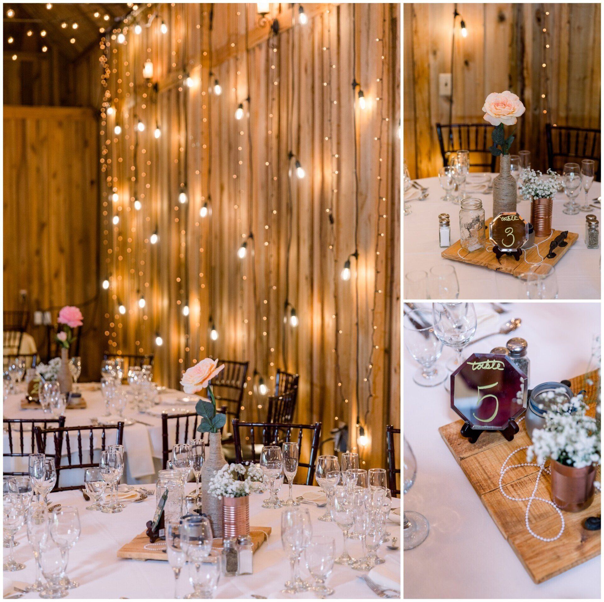 Elegant wedding reception table with white linens, candles, and rustic wood backdrop with string lights