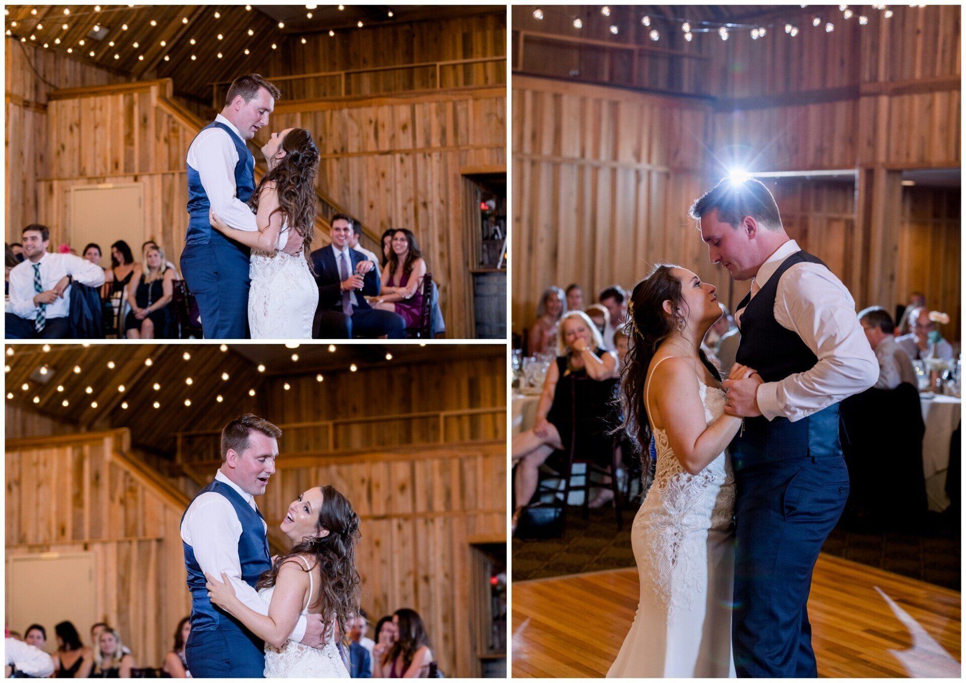 Wedding couple dancing in a rustic barn under string lights, guests seated nearby.