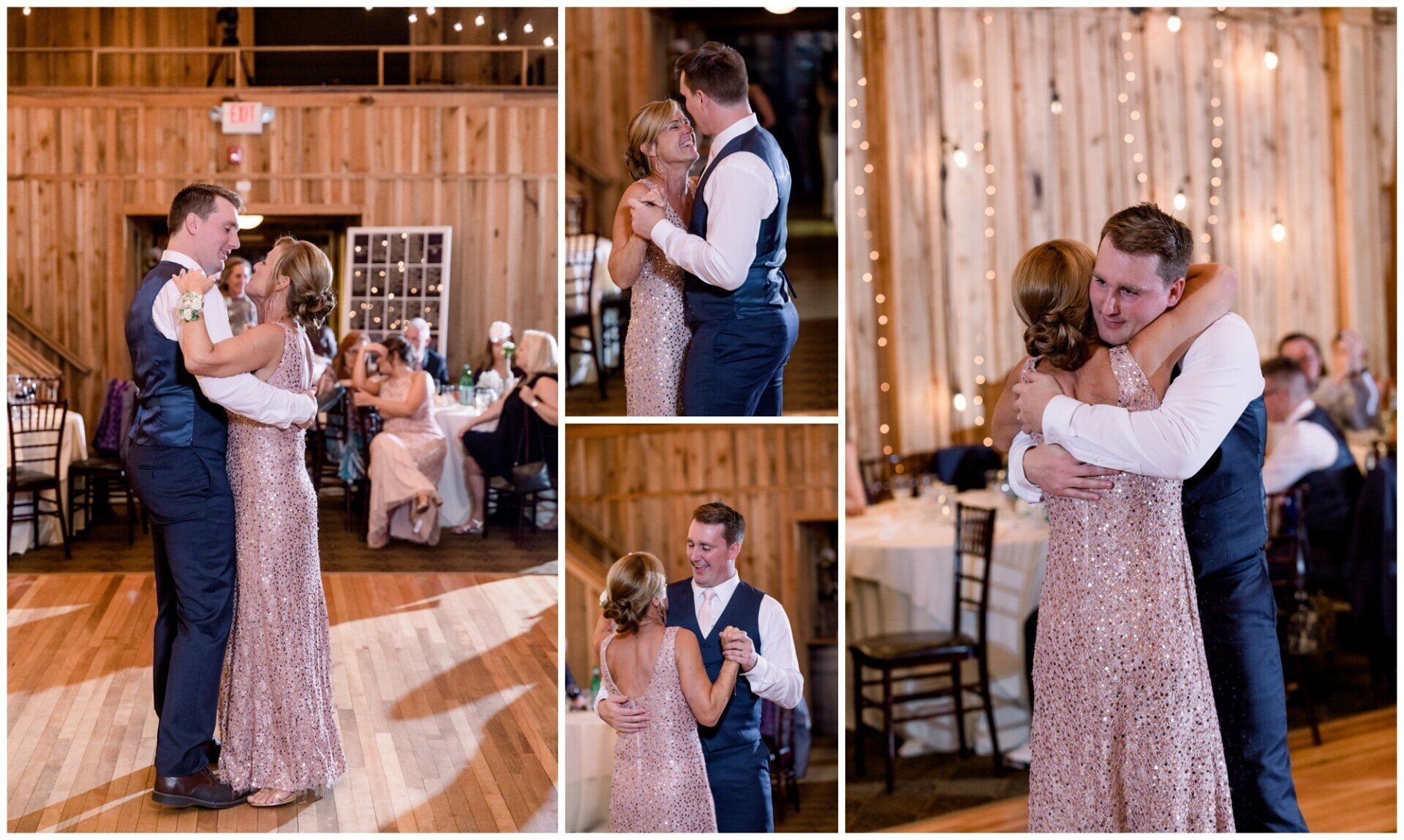 Couple slow dancing at a rustic indoor wedding reception, with guests and warm string lights nearby