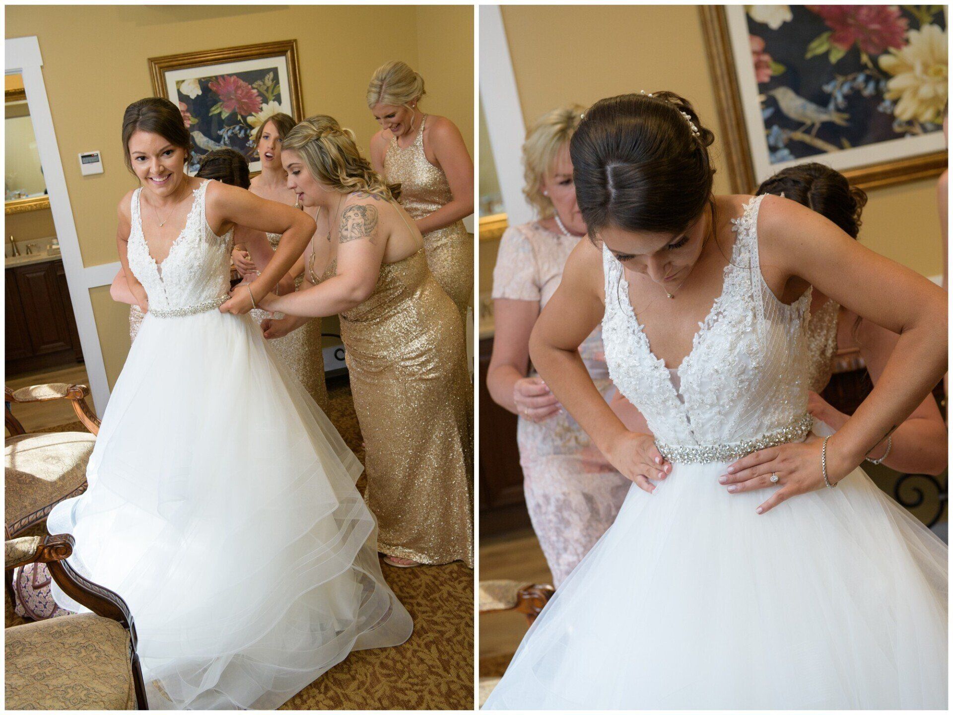 Bride in white gown being helped by bridesmaids, adjusting dress in a warmly lit room
