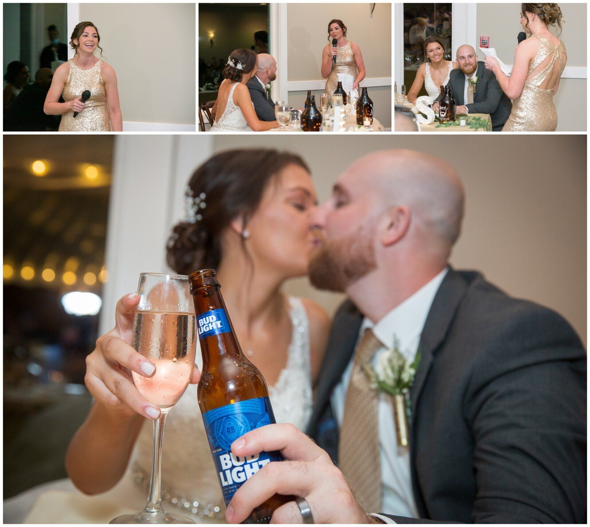 Bride and groom kiss during wedding toast, holding champagne and a beer bottle at a reception table.
