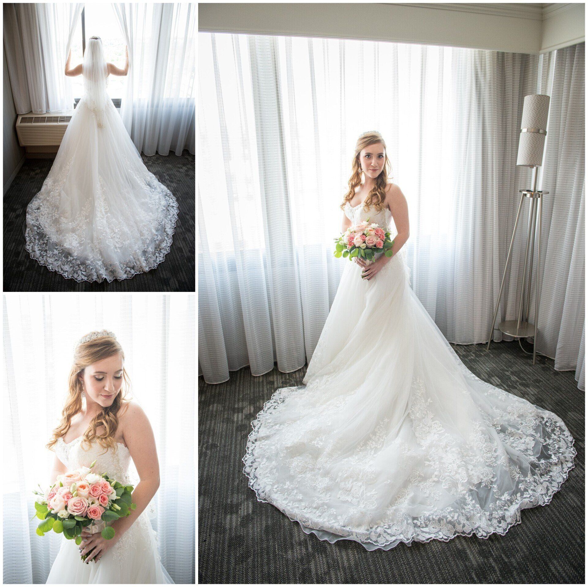 Bride in a white lace wedding gown holding a pink bouquet by a window
