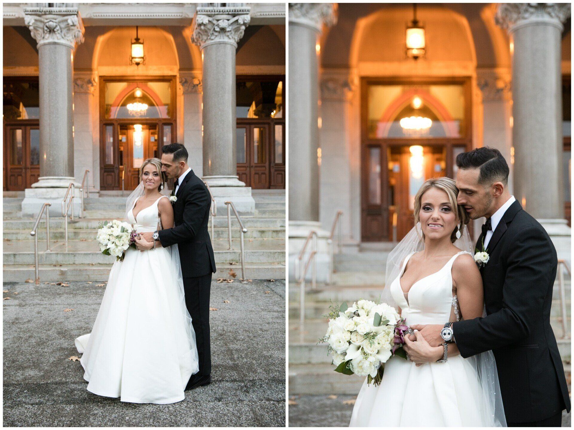 Bride and groom posing outside a lit stone building, holding a bouquet and embracing in wedding attire