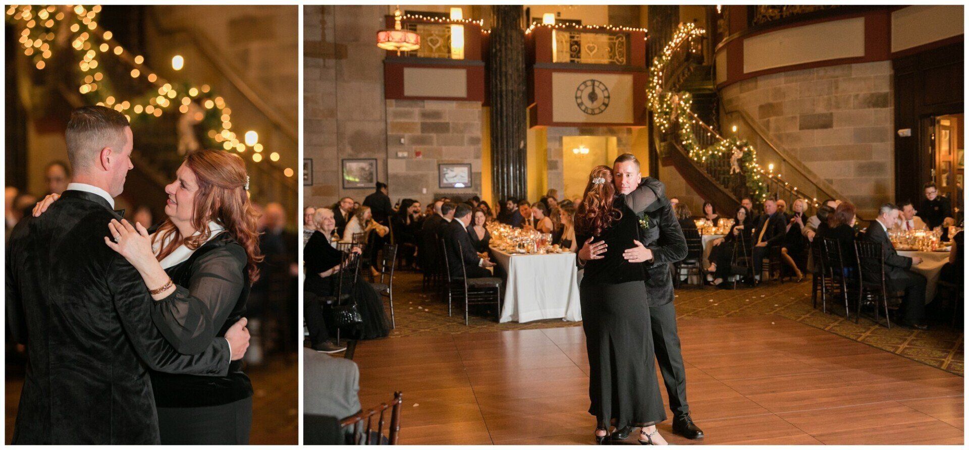 Couple slow dancing at a candlelit reception in a warmly lit hall, guests seated around them