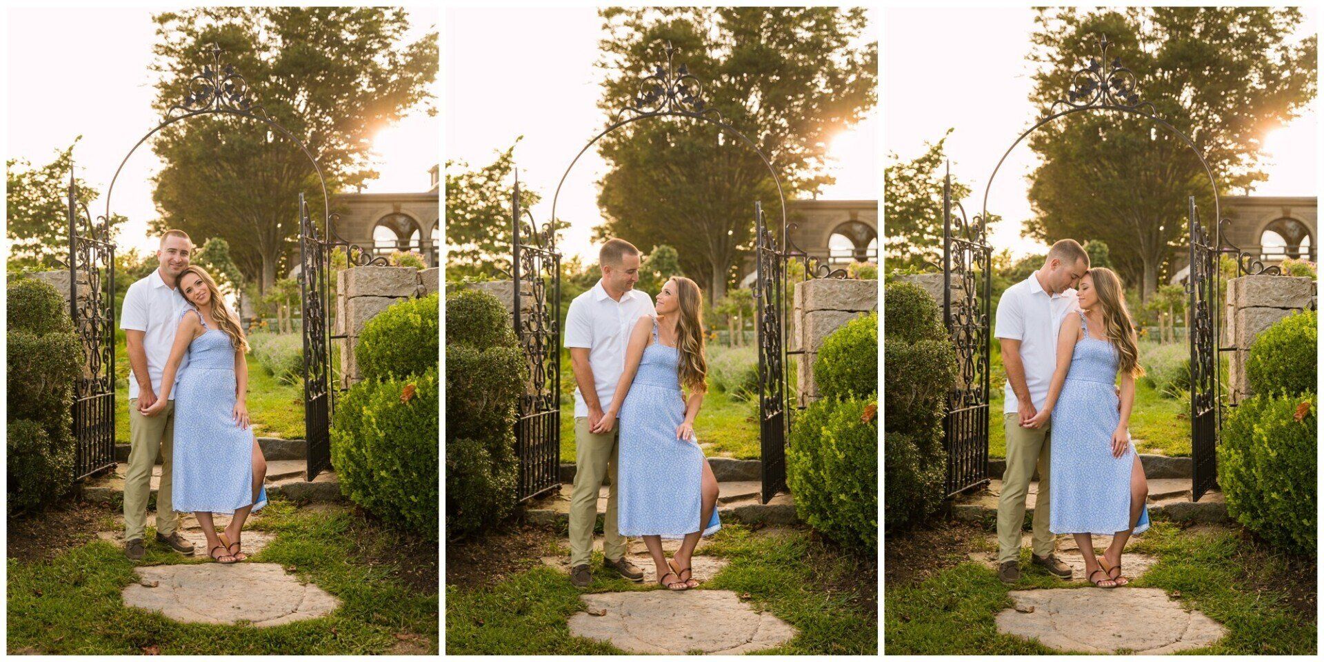 Couple in pastel outfits standing on a garden path at sunset, surrounded by greenery and flowers.