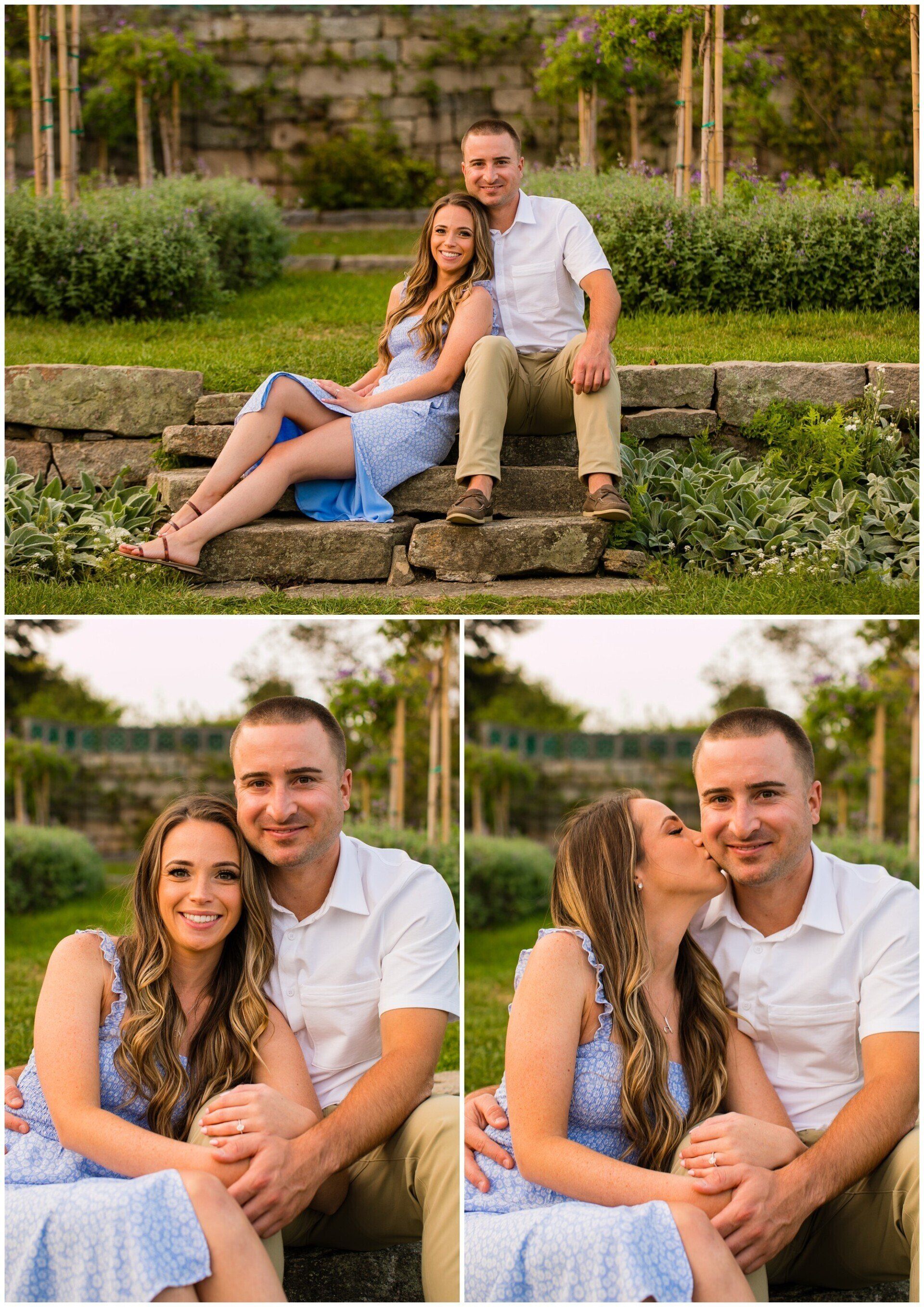 Couple sitting on stone steps in a garden, smiling and posing together outdoors.
