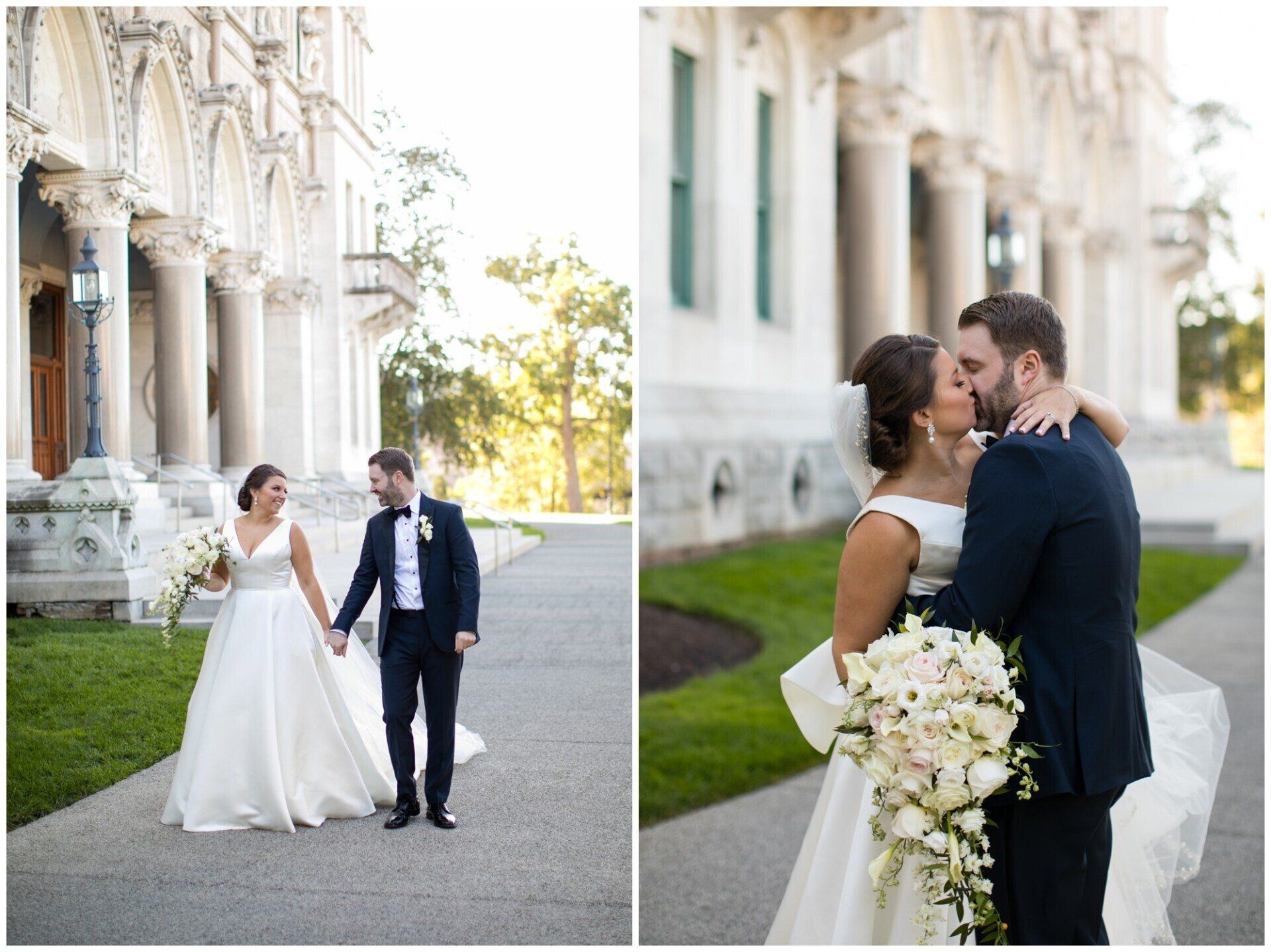 Bride and groom walk and embrace outside a grand building, with bouquet in hand